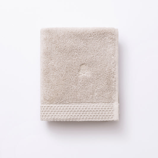 TOALLA DE TOCADOR NIDUS 30X50CM 100%ALGODÓN 550GSM ECRU LOGO BORDADO HAZE SCALPERS HOME SC